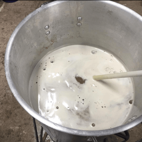 A picture of my turkey fryer brew kettle with hot wort boiling in it.